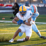 A Ballantyne Ridge player tackles Fort Mill's Josef Anderson just short of the goal line. Anderson would score on the next play.