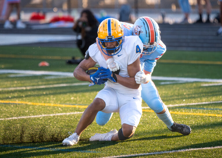 A Ballantyne Ridge player tackles Fort Mill's Josef Anderson just short of the goal line. Anderson would score on the next play.