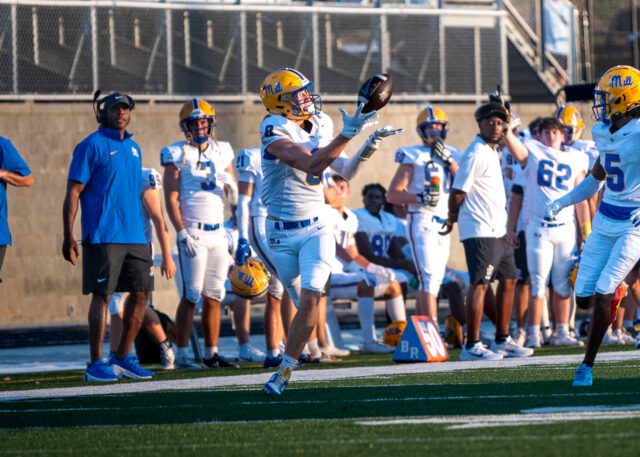 Fort Mill wide receiver, Tanner Mays, caught the throw from Quinn Kelly along the side lines and sprinted for a touchdown.