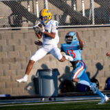 Brandon Moore reels in a throw from Yellow Jacket QB, Quinn Kelly.