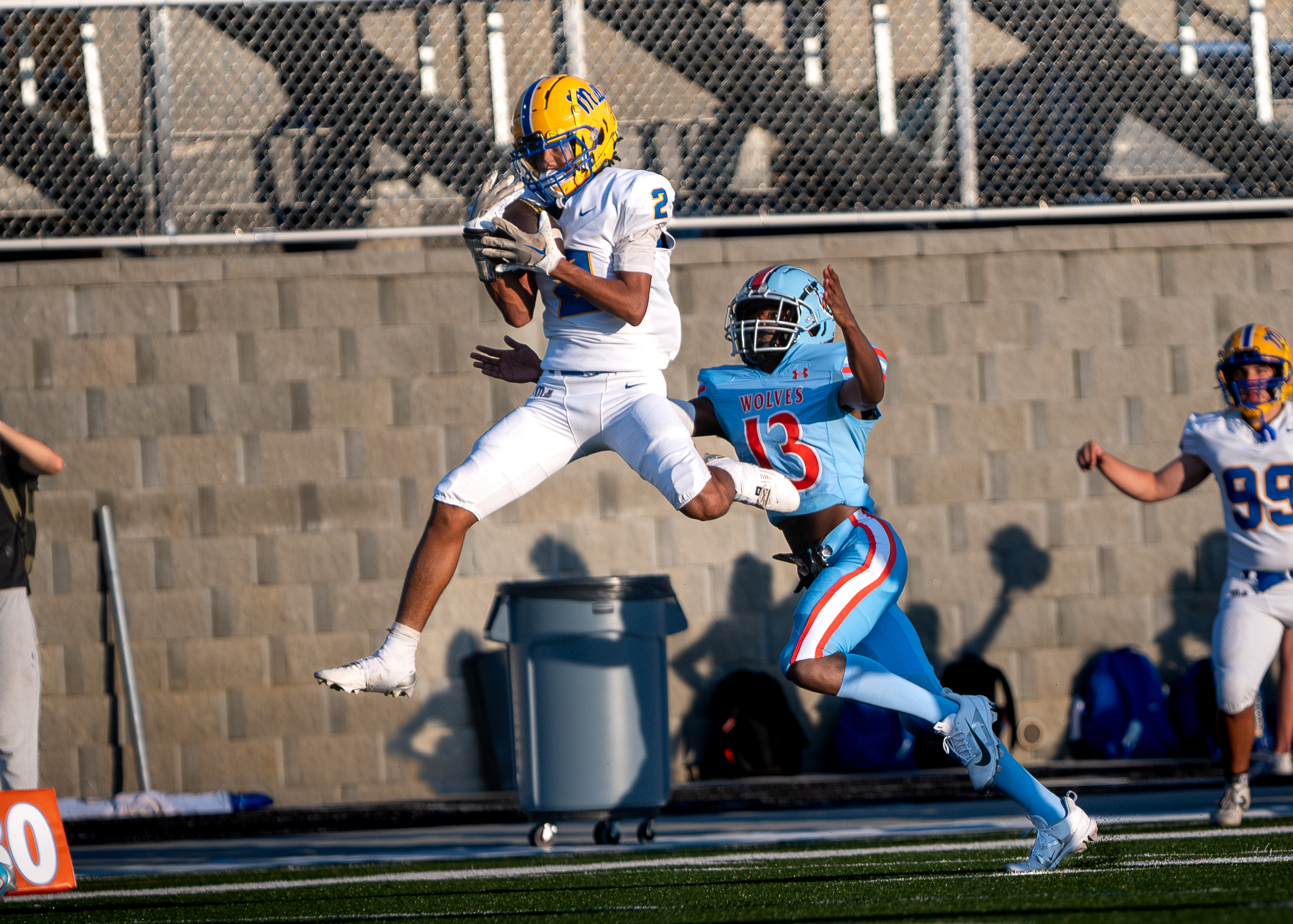 Brandon Moore reels in a throw from Yellow Jacket QB, Quinn Kelly.